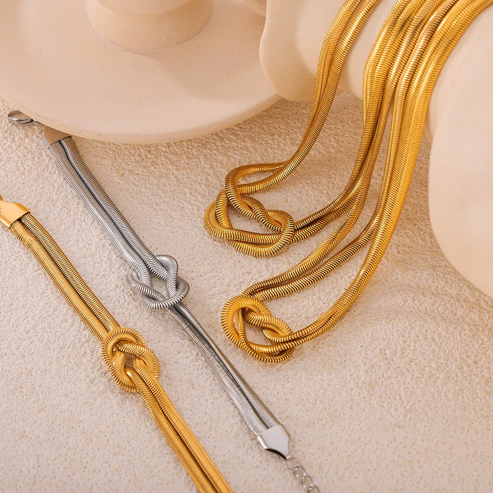 BRACCIALE KNOT PLACCARO ORO