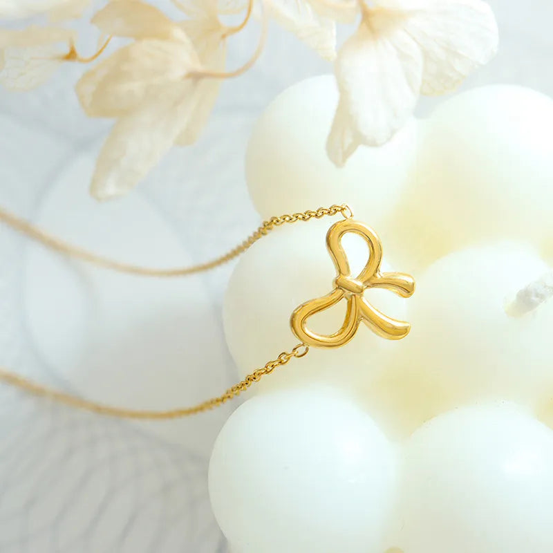 COLLANA FIOCCO ORO PLACCATO 18K