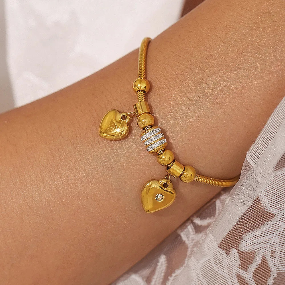 BRACCIALE DUE CUORI PLACCATO ORO 18K