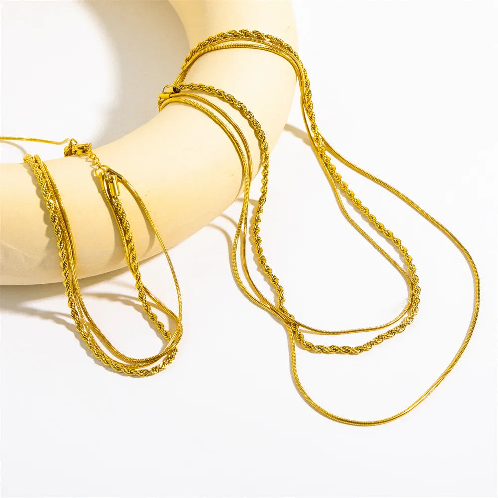 COLLANA TRIS ORO PLACCATO 18K