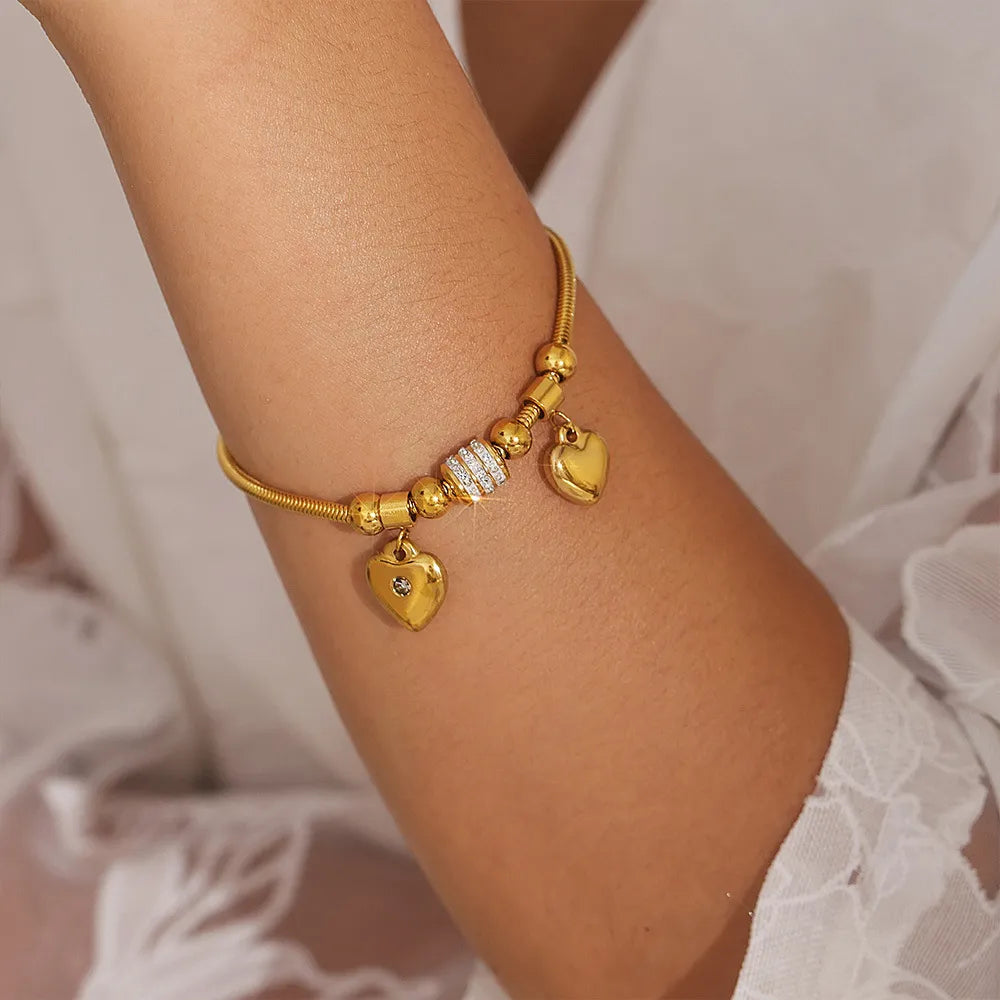 BRACCIALE DUE CUORI PLACCATO ORO 18K